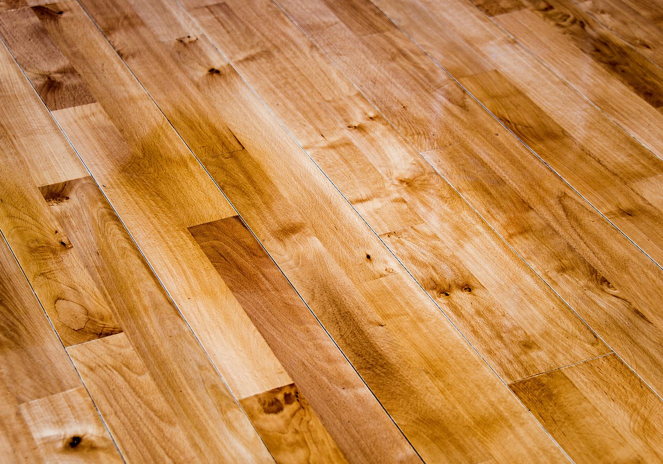 Wood floor. Wood floor made of oak material. Golden color of wood floor. New wood floor installed.